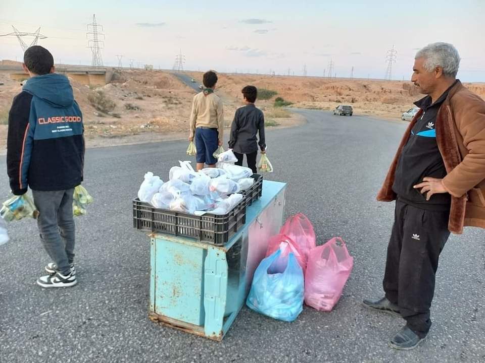 حملة إفطار صائم بجسر وادي الأثل الرابط بين طريق طرابلس وجبل نفوسة